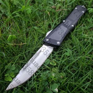 Microtech combat 碳纤柄战斗恐龙直跳自动刀（尖头）